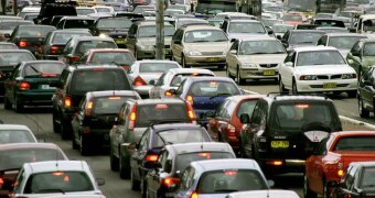 Cars in peak hour traffic.