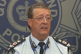 Queensland Police Commissioner Ian Stewart addresses the media