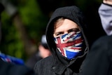 Far right protester with facemask