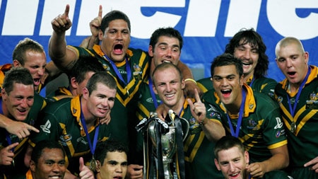 Sweet revenge ... The Kangaroos celebrate with the Tri-Nations trophy