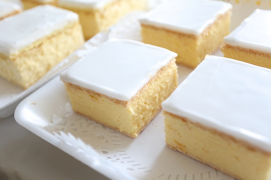 Custard-filled slice with white icing