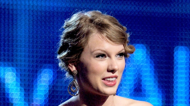 Taylor Swift accepts the Best Country Album award