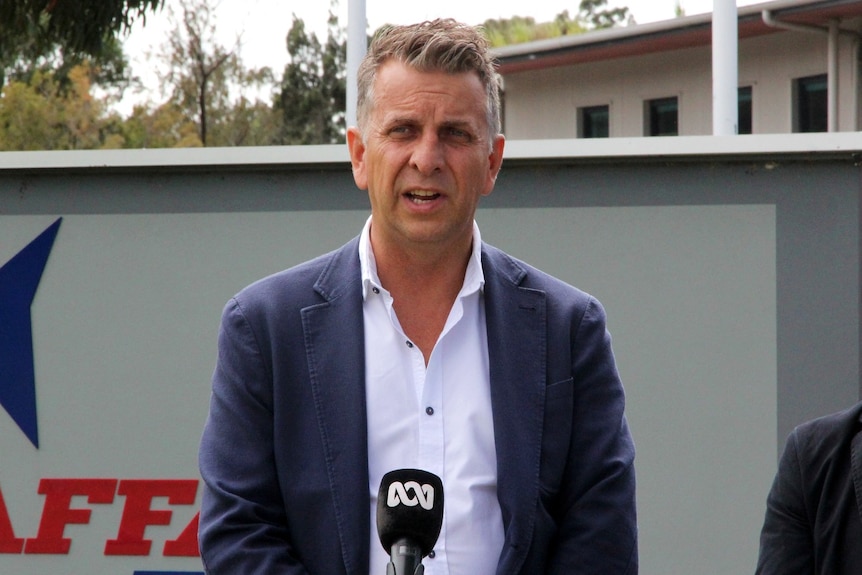 Andrew Constance, a man wearing suit
