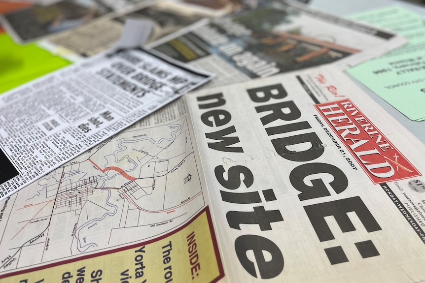 Newspaper clippings about the need for a bridge.
