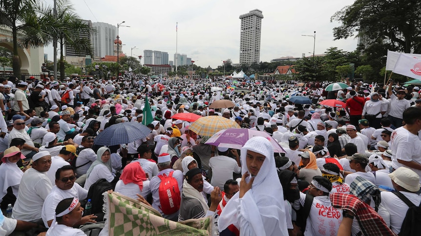 Thousands of protesters gather filling the streets of KL