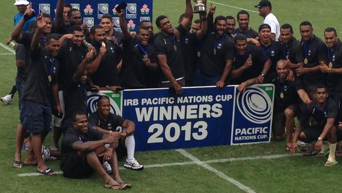 The Fiji team celebrates after their Pacific Nations Cup win