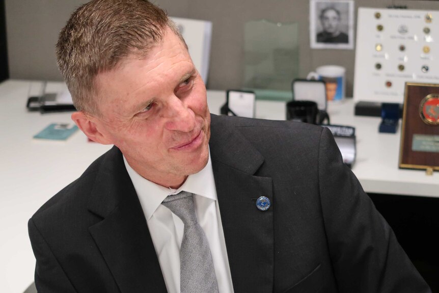 Head of the NSW Child Abuse Squad, Detective Chief Inspector Peter Yeomans, in his office.
