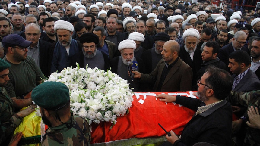 Mourners gather at the funeral of Mustafa Badreddine, a top Hezbollah commander.