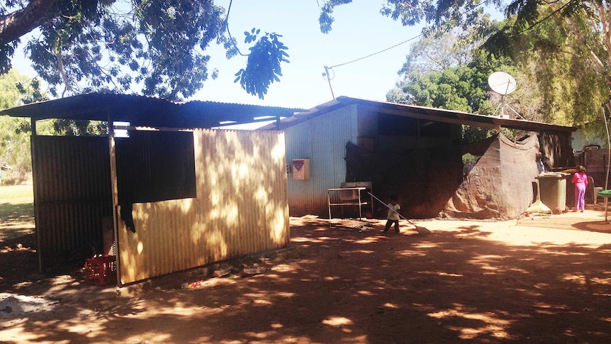 Corrugated iron shelters at an Aboriginal community.