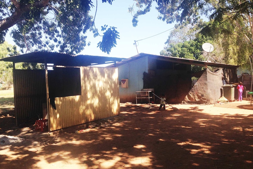 Corrugated iron shelters at an Aboriginal community.