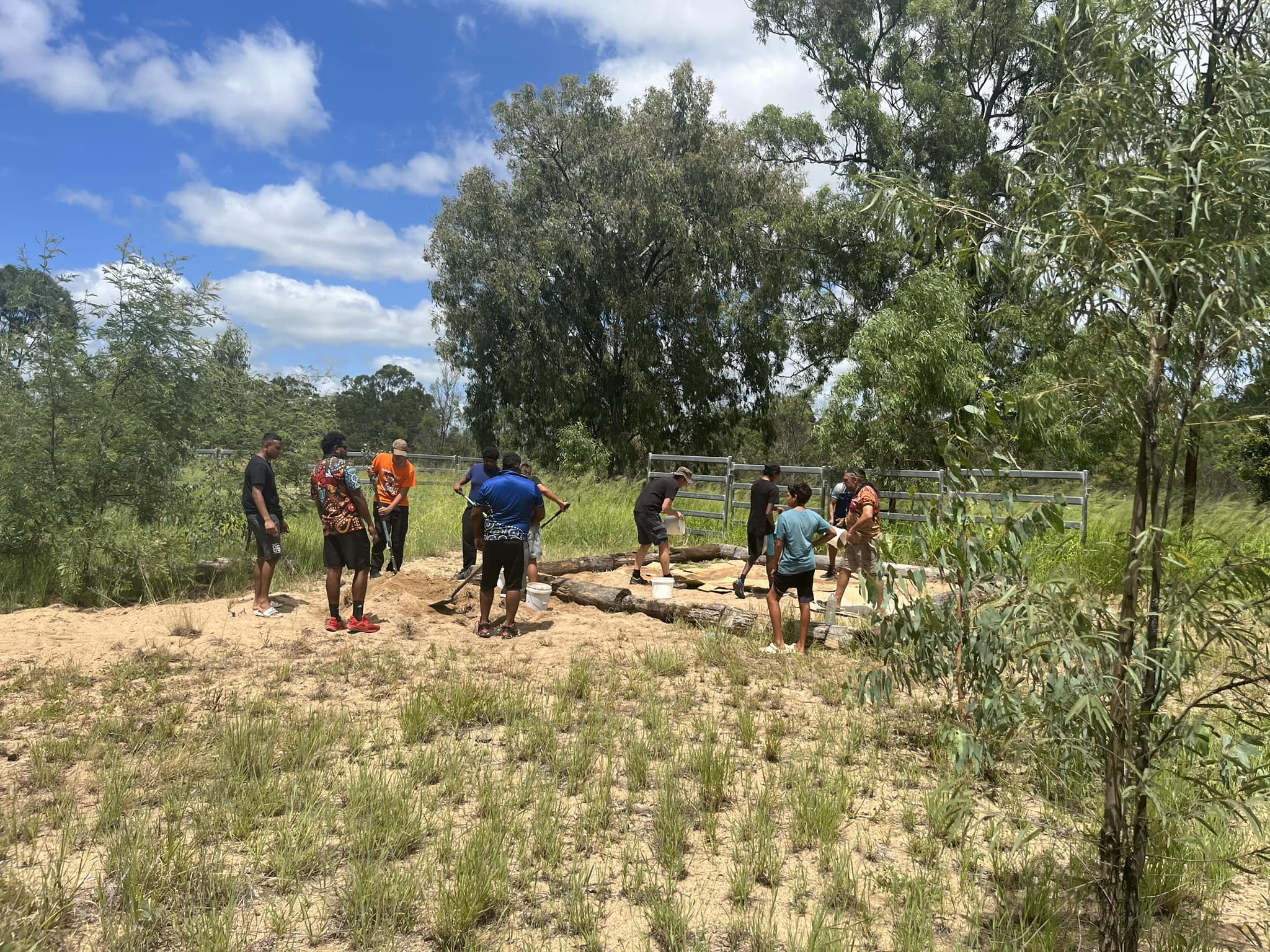 Indigenous students from Silver Lining Ficks Crossing tend to a veggie patch on their South Burnett property.