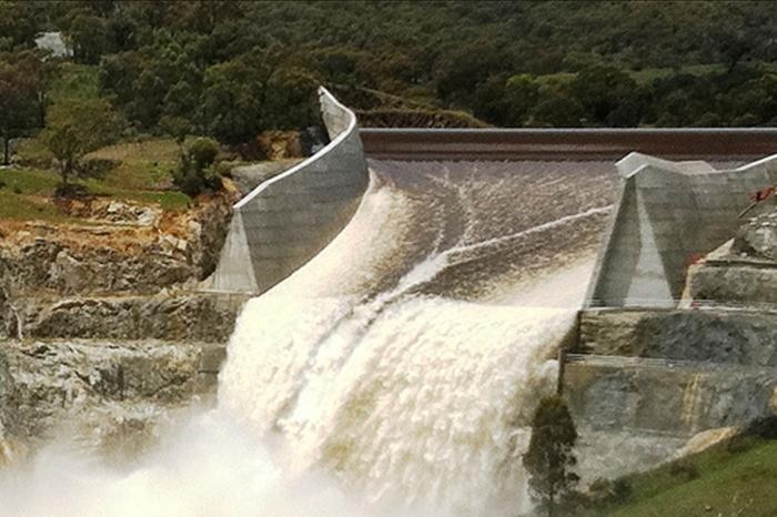 The ACT's dams are 100 per cent full, after the Territory recorded its fourth wettest year on record.