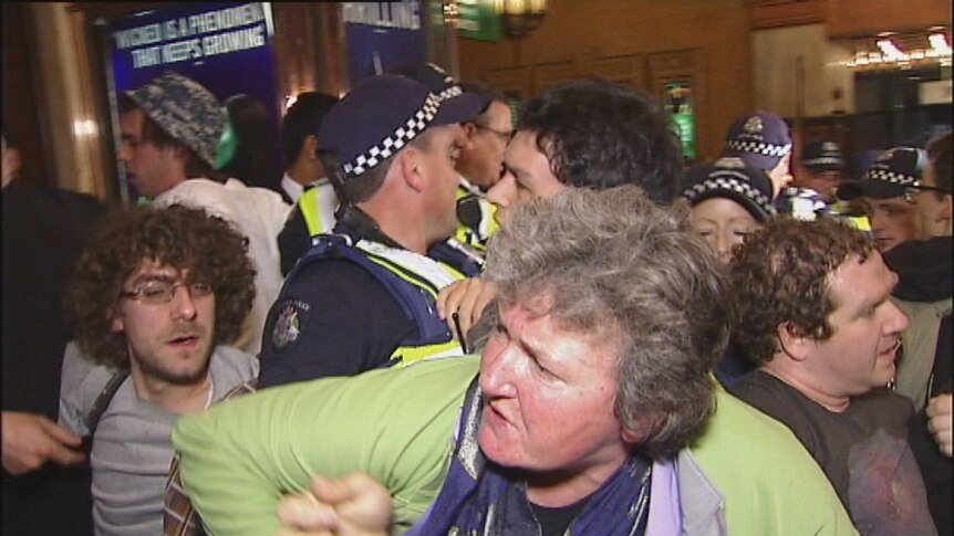 About 50 protesters clashed with police outside a Liberal Party fundraiser.