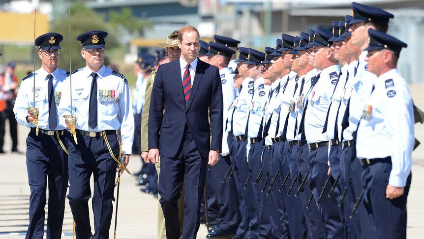 Prince William inspects the honour guard at Amberley RAAF Base
