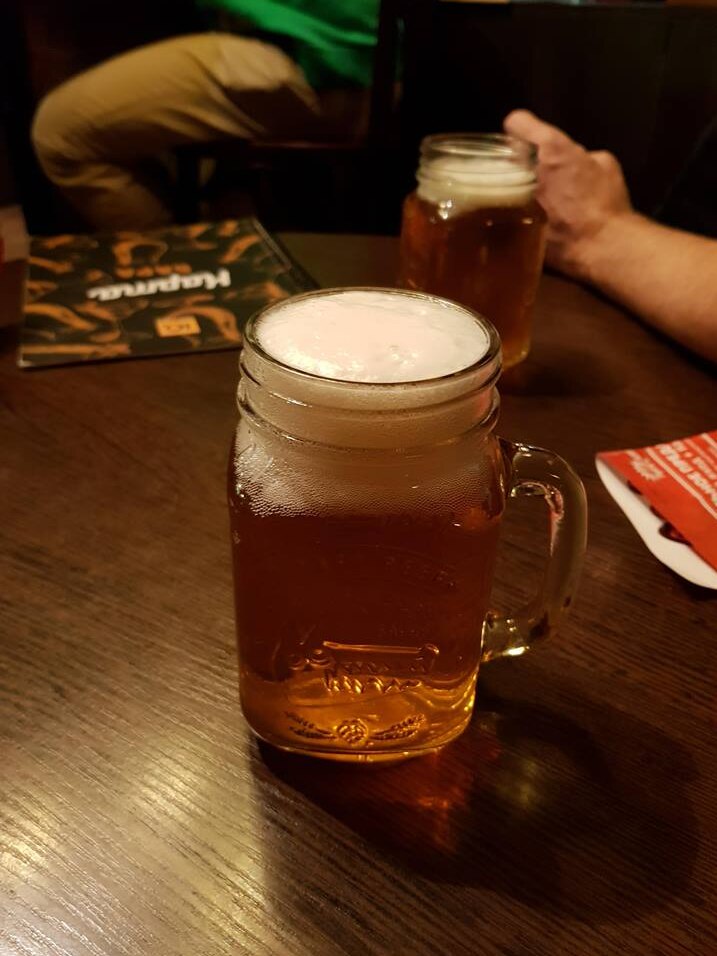 A jar of beer.