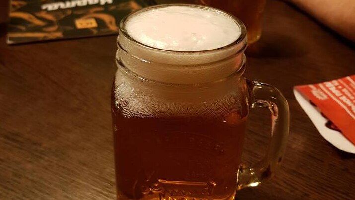 A jar of beer.