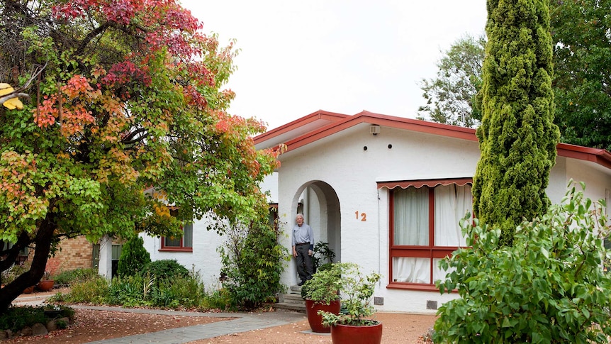 Ermelindo Maculan in front of his Duffy home