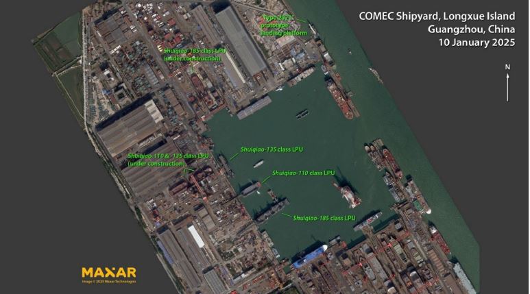 A satellite image of a Chinese port with multiple ships being built 