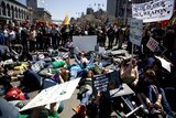 Protesters lie on Embarcadero St in San Francisco, blocking the intended route of the relay.