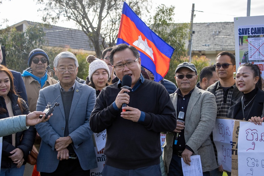 Heng Meang Tak speaking at a protest.