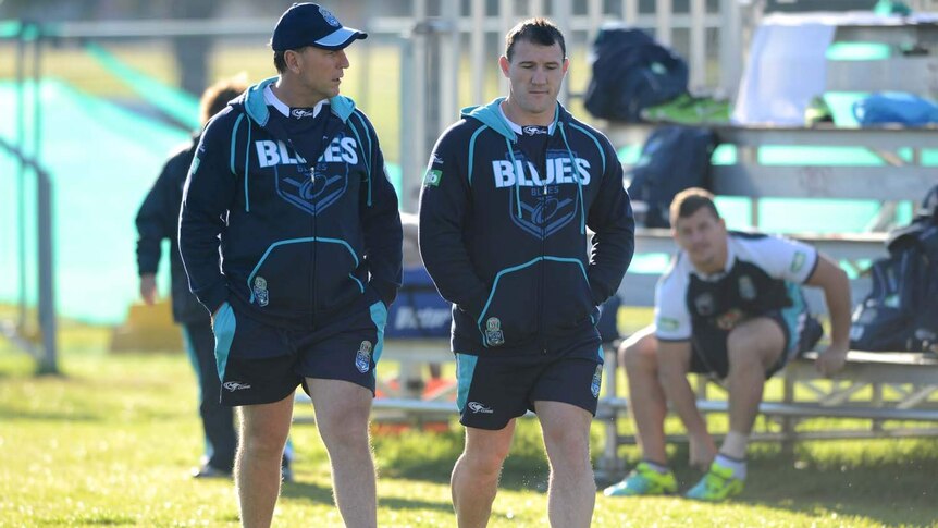 Paul Gallen talks to a trainer ahead of a fitness test
