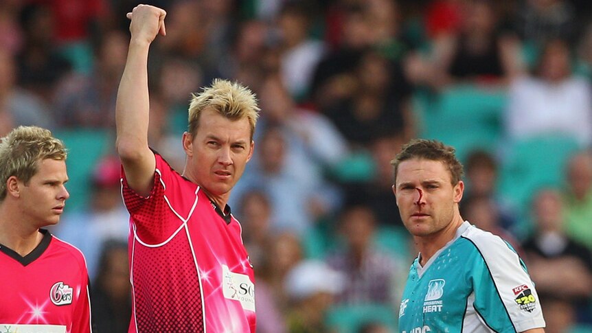 Brett Lee of the Sixers calls for help after hitting Brendon McCullum