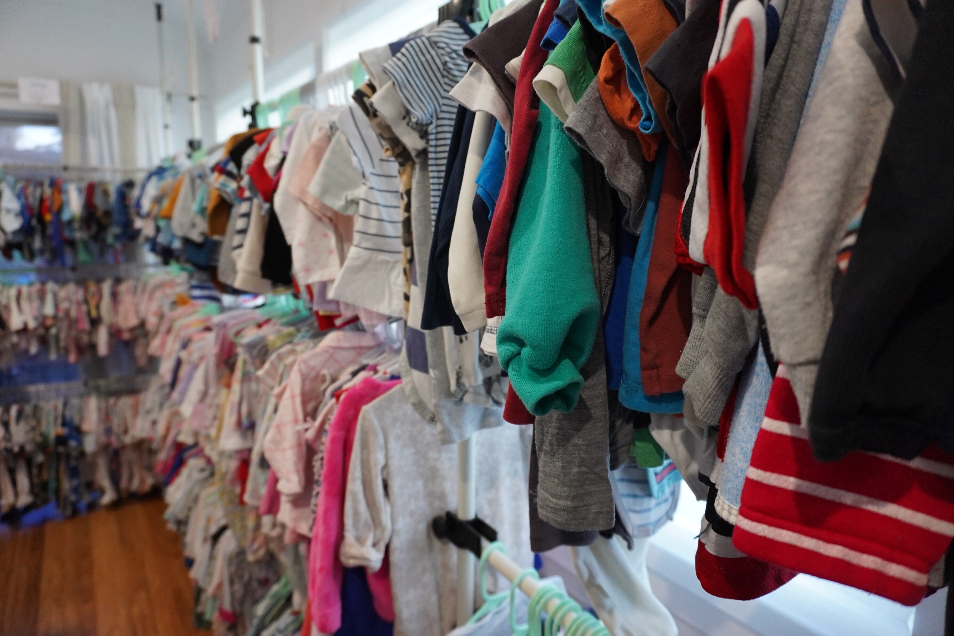 Baby clothes on a rack