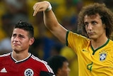 James Rodriguez is consoled by David Luiz and Dani Alves