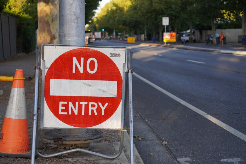 A road sign blocking entry to a section of Cross Road in Adelaide.