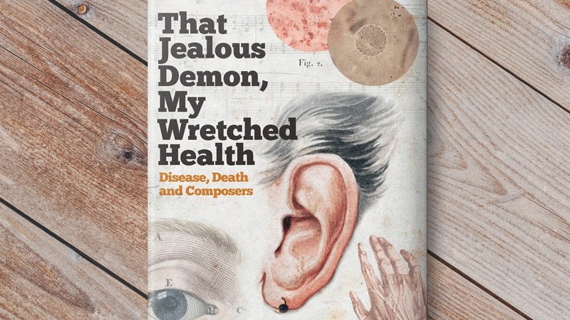 Image of Jonathan Noble's book titled That Jealous Demon, My Wretched Health, lying on a wooden table.