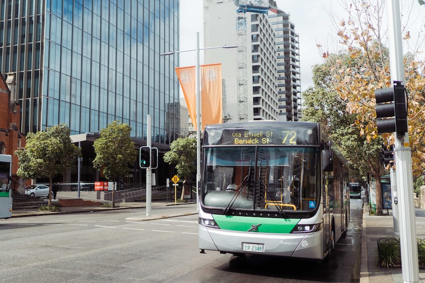A Transperth bus travelling through the city.