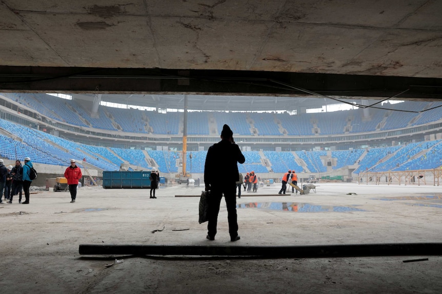 Workers at the Zenit Stadium in St Petersburg.