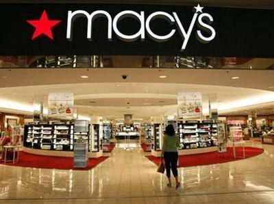 A woman walks into a Macys store in Denver