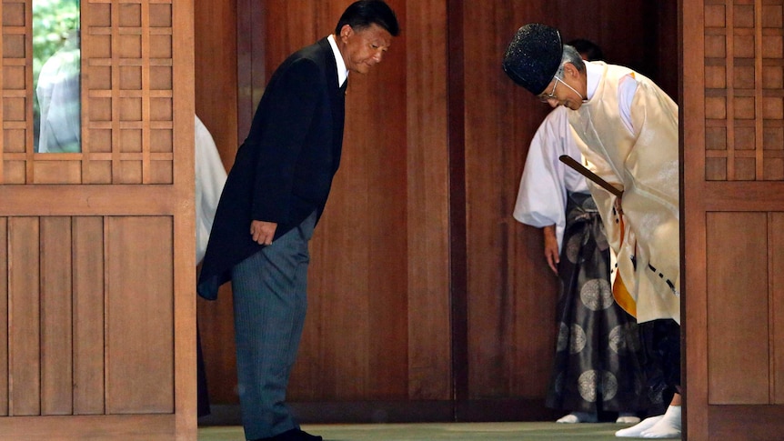Yoshitaka Shindo leaves the Yasukuni Shrine in Tokyo the 68th anniversary of Japan's defeat in WWII.