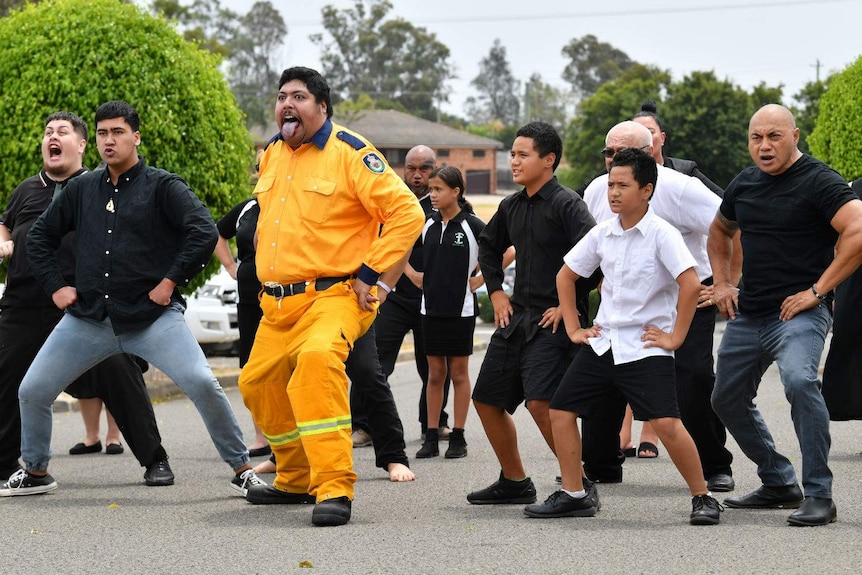 A group of man performing a haka.