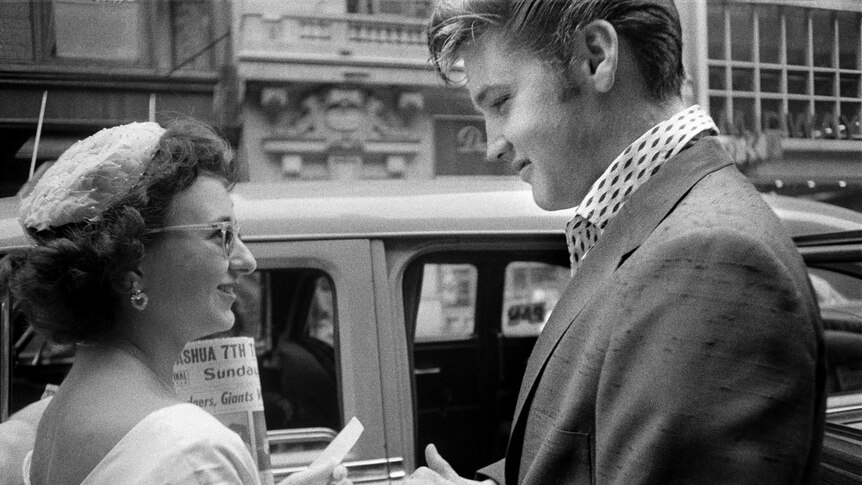Elvis meets a fan in New York City. July 1, 1956.