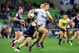Tom Trbojevic of the Sea Eagles makes a run against Melbourne at AAMI Park.