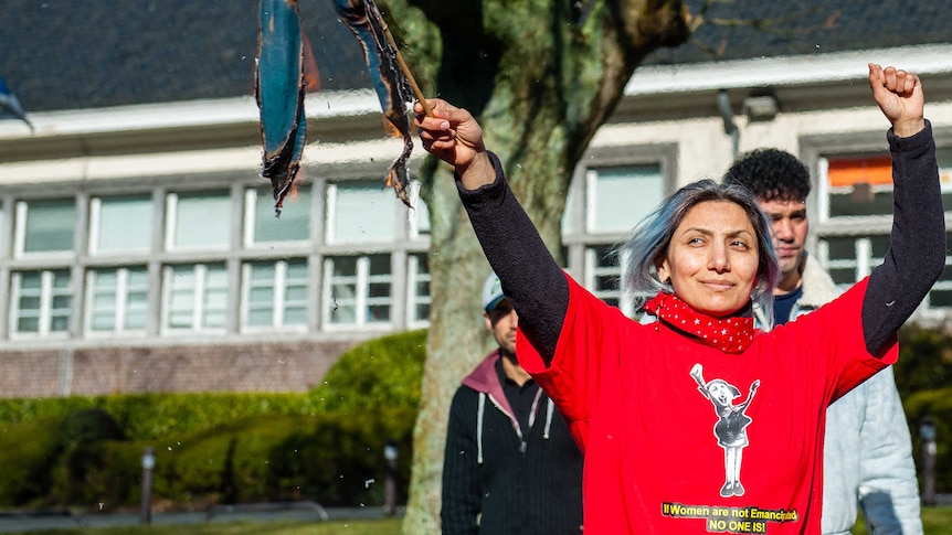 Iranian woman in front of the Iranian embassy in Brussels, protesting against the compulsory hijab in Iran, March 8 2020