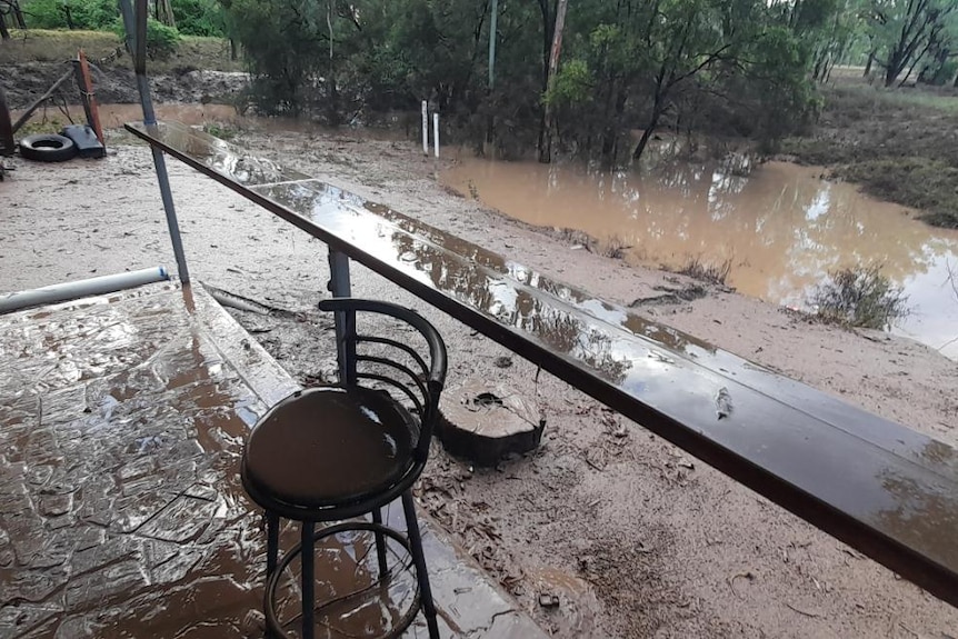 A backyard with floodwaters