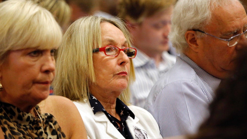 June Steenkamp listens to the testimony of South African Paralympic athlete Oscar Pistorius.