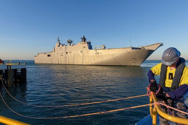 A large navy ship in the Darwin Harbour.