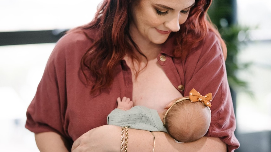 Shot of a baby breastfeeding from her mother.