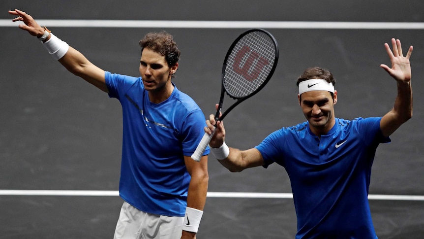 Rafael Nadal and Roger Federer of Team Europe react to their doubles win at the Laver Cup.