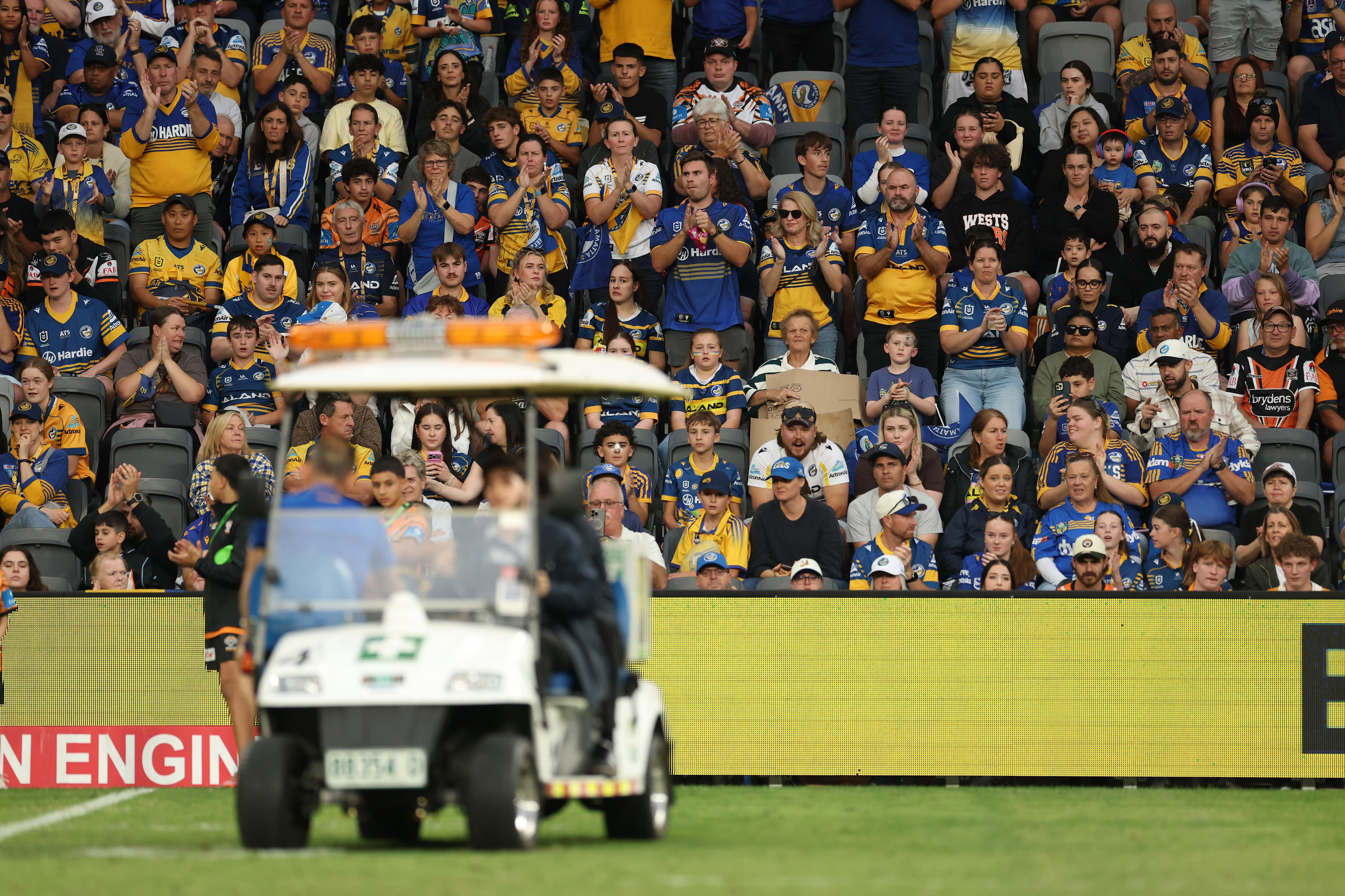 Bailey Simonsson is carted off the field