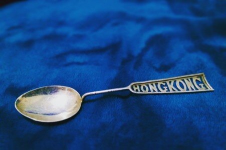 A teaspoon made in Hong Kong.