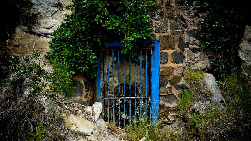 The blue gate, rumoured to have been used by escaping prisoners