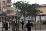An image grab taken from a video posted on YouTube on May 20, 2011 shows Syrian soldiers running after anti-regime protesters during a demonstration in Hama, north of Damascus.