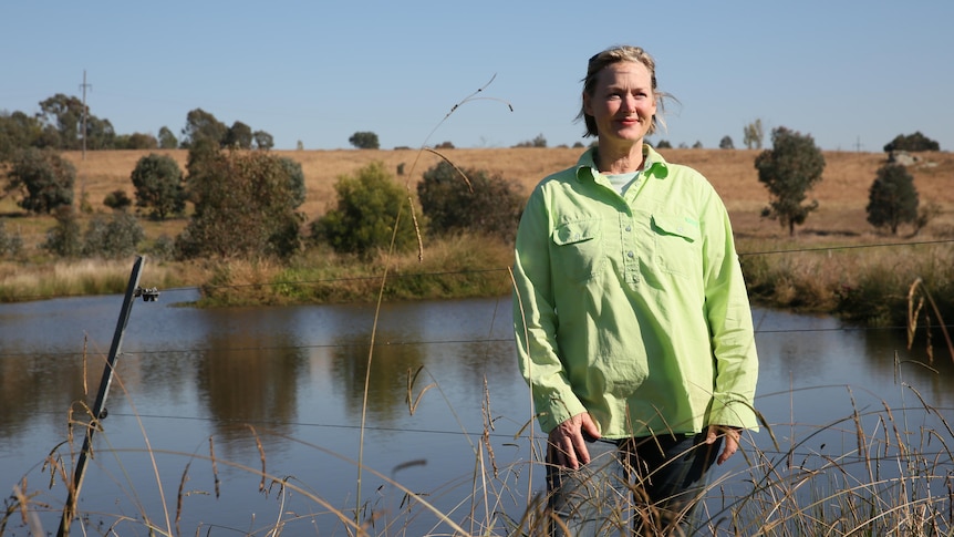 Farmer Trudi Refshauge stands next to her biodiverse dam