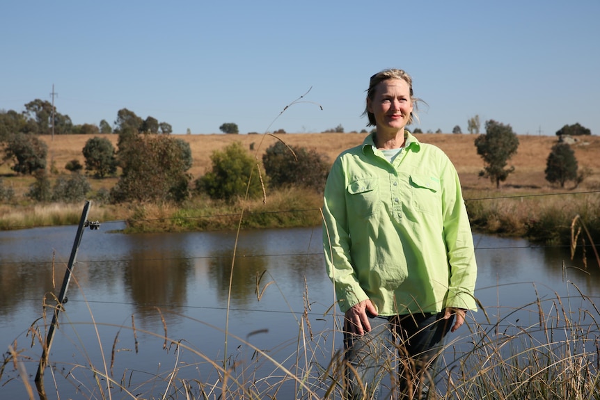 Farmer Trudi Refshauge stands next to her biodiverse dam