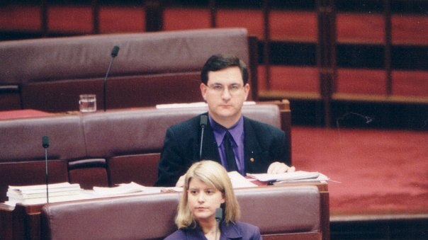 Former Australian Democrats senators Andrew Bartlett and Natasha Stott-Despoja sit in their seats in the Upper House.